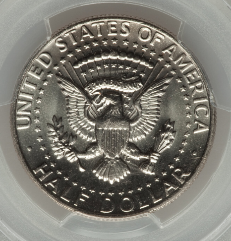 Kennedy half dollar doubled die obverse error showing doubled lettering on LIBERTY under magnification